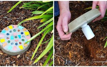 someone is using cement to make a garden decoration with colored dots on the ground and in the grass