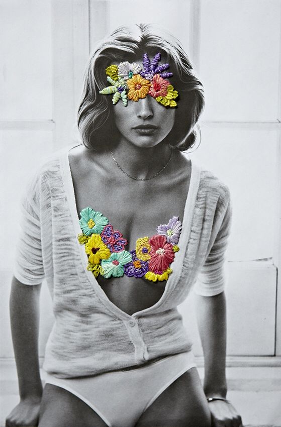 a black and white photo of a woman with flowers in her hair, taken on instagram