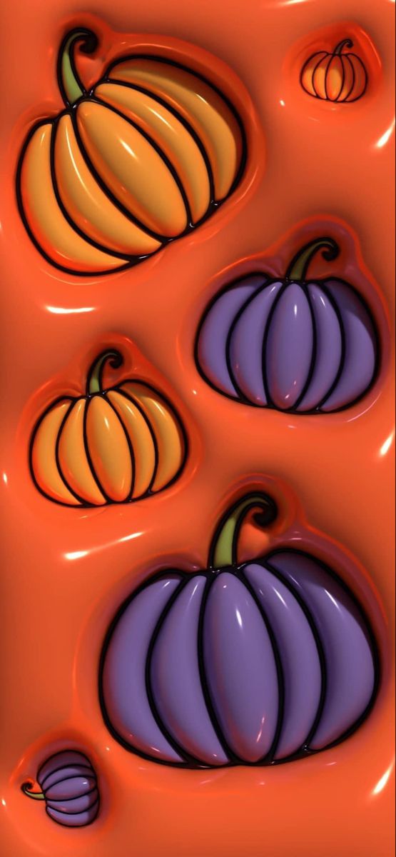 an orange background with three pumpkins on it