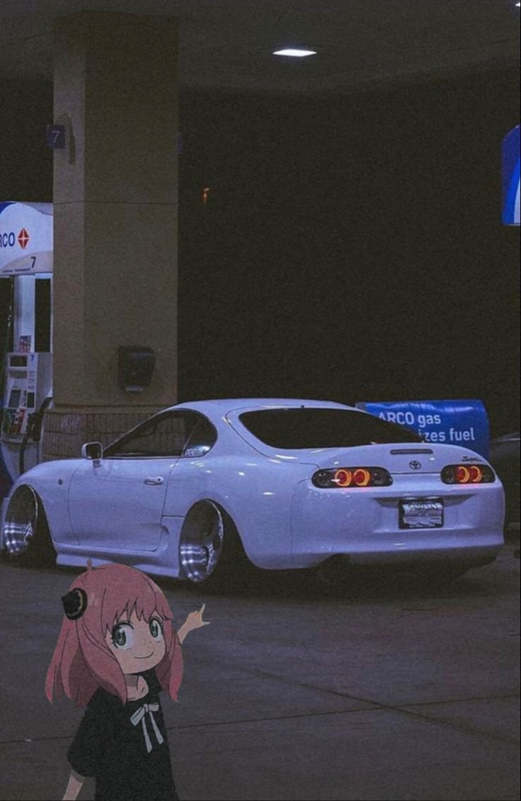 a girl standing in front of a white car with her hand up to the side