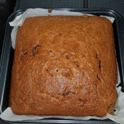 a loaf of bread sitting in a pan on top of a table