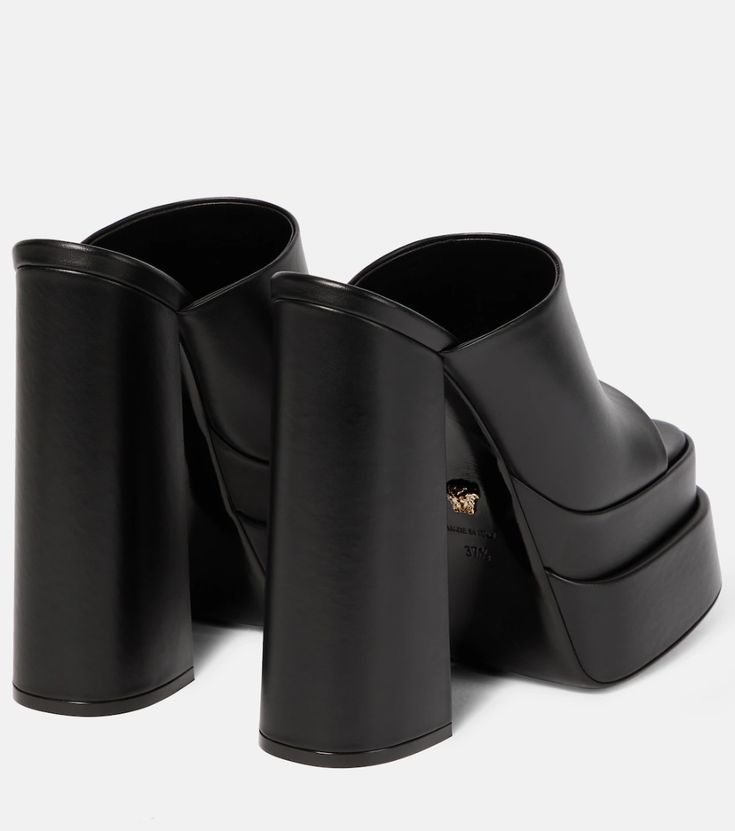 Leather Platform Sandals in Black - Versace | Mytheresa Luxury Chunky Platform Sandals, Luxury Open Heel Chunky Platform Heels, Luxury Chunky Platform Heels With Open Heel, Luxury Open Toe Chunky Platform Heels, Luxury Open Toe Heels With Chunky Platform, Luxury Chunky Platform Heels, Platform Calf Leather Mules, Platform Mules In Calf Leather, Luxury Evening Mules With Platform