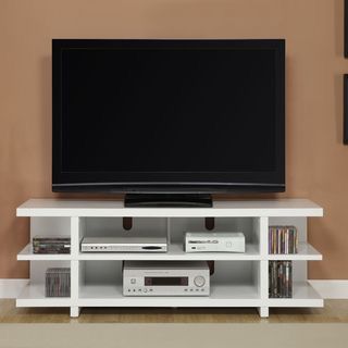 a flat screen tv sitting on top of a white entertainment center