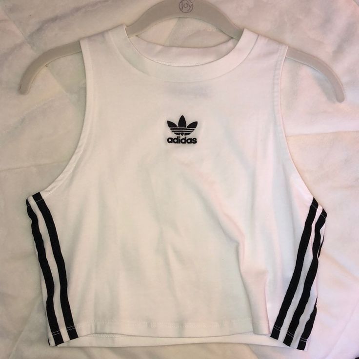 Adidas Tank Top. New, Never Worn. It Is In Excellent Condition. Selling Because It Is Too Big On Me. White Athleisure Crop Top For Streetwear, Trendy White Crop Top For Sports, Sporty White Tank Top For Spring, White Sporty Crop Top For Spring, Sporty White Crop Top For Spring, White Cotton Sports Crop Top, Adidas Cotton Tank Top For Spring, Adidas Casual Summer Tank Top, Casual Adidas Summer Tank Top