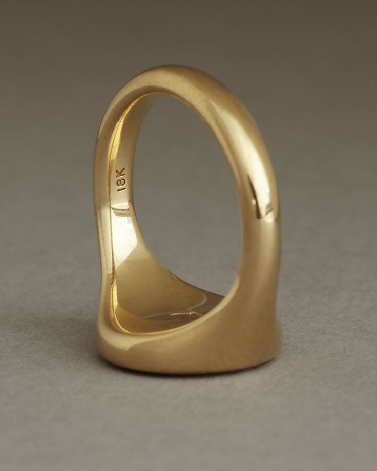 Meet your new family heirloom. Like the Hugo Signet, the Florentine Signet is a ring we would have loved to have discovered in our grandparent’s drawer — a substantial, solid gold masterpiece with timeworn edges and perfect proportions. Look closely at the band and the interior of this ring; its fullness and softness set it apart. Anciently, signet rings were markers of rank and status. The designs acted as signature stamps to authenticate documents and deals — the more elaborate the design, the Luxury Engagement Signet Ring With Open Design, Luxury Adjustable Gold Signet Ring, Luxury Gold Signet Ring With Tension Setting, Classic Yellow Gold Domed Sapphire Ring, Classic Domed Yellow Gold Sapphire Ring, Timeless Oval Dome Ring Stamped 14k, Formal Yellow Gold Domed Sapphire Ring, Hallmarked Yellow Gold Domed Signet Ring, Timeless Domed Signet Ring With Polished Finish