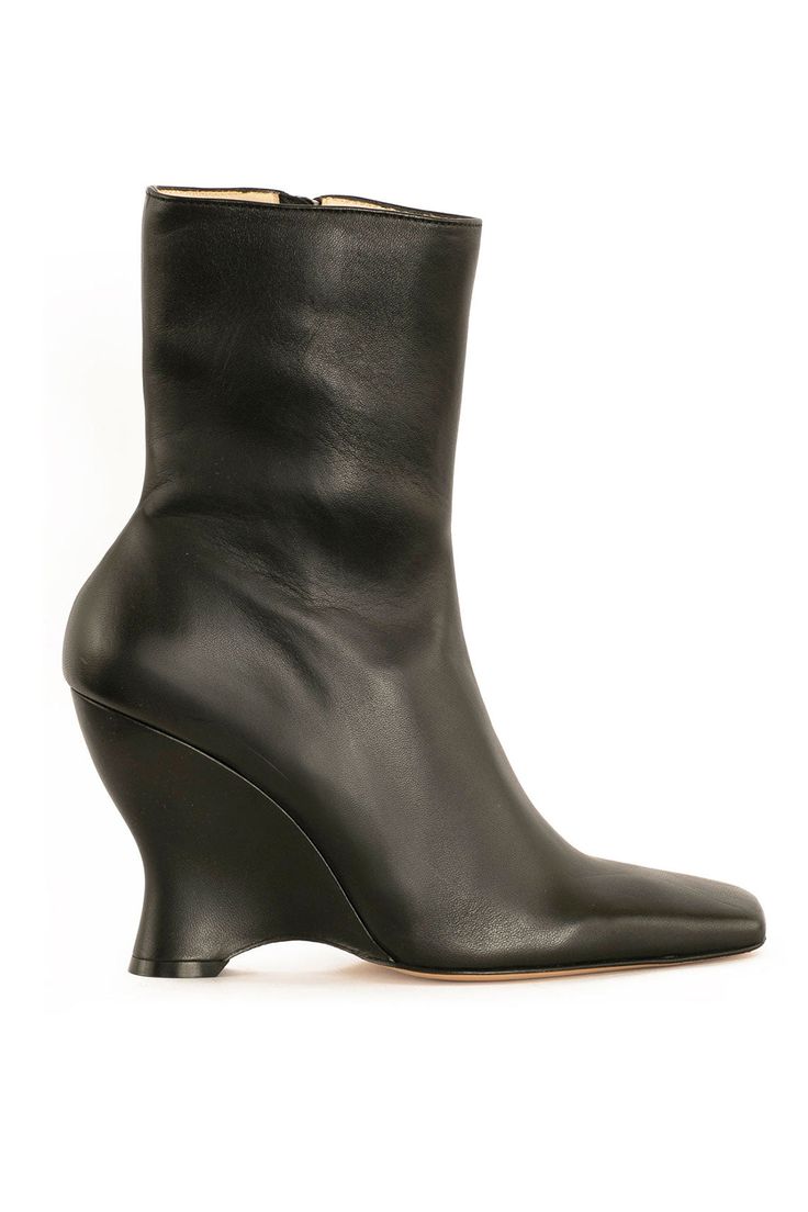 Elegant, curved boot with a shaped wedge heel and squared tapered toe. 3.75" heel. 100% leather with a side zip closure. Handmade and sustainably produced. Boots With Stars, Fall 23, Black Crane, Mara Hoffman, Fall 2023, Luxury Shoes, Fashion Company, Shoe Brands, Wedge Heels