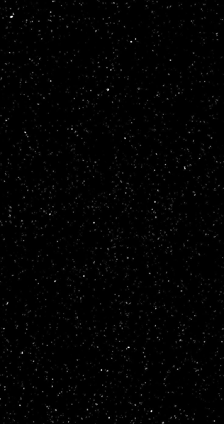 black and white photograph of stars in the night sky