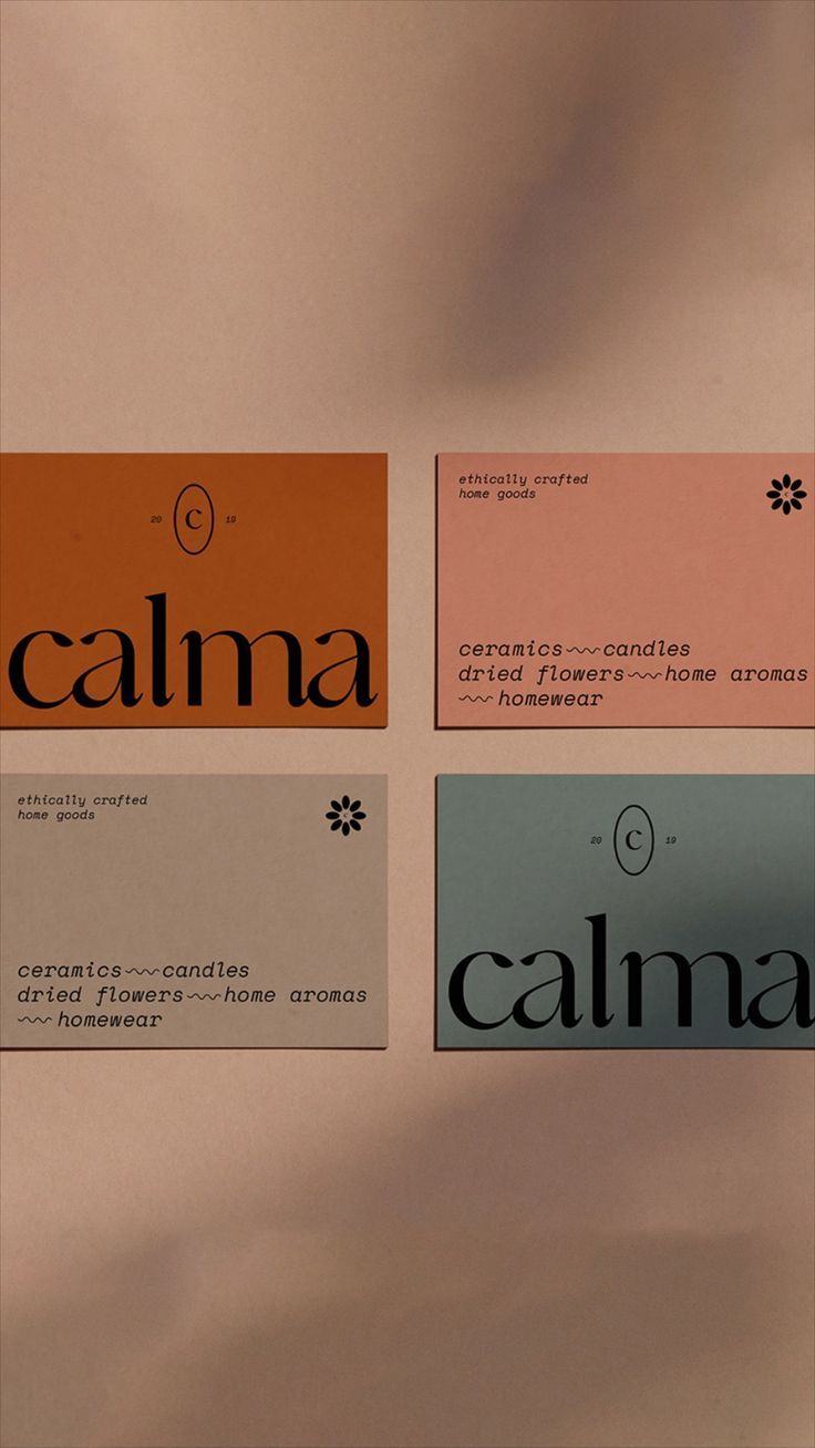 three business cards with the word calma written on them in black and orange colors