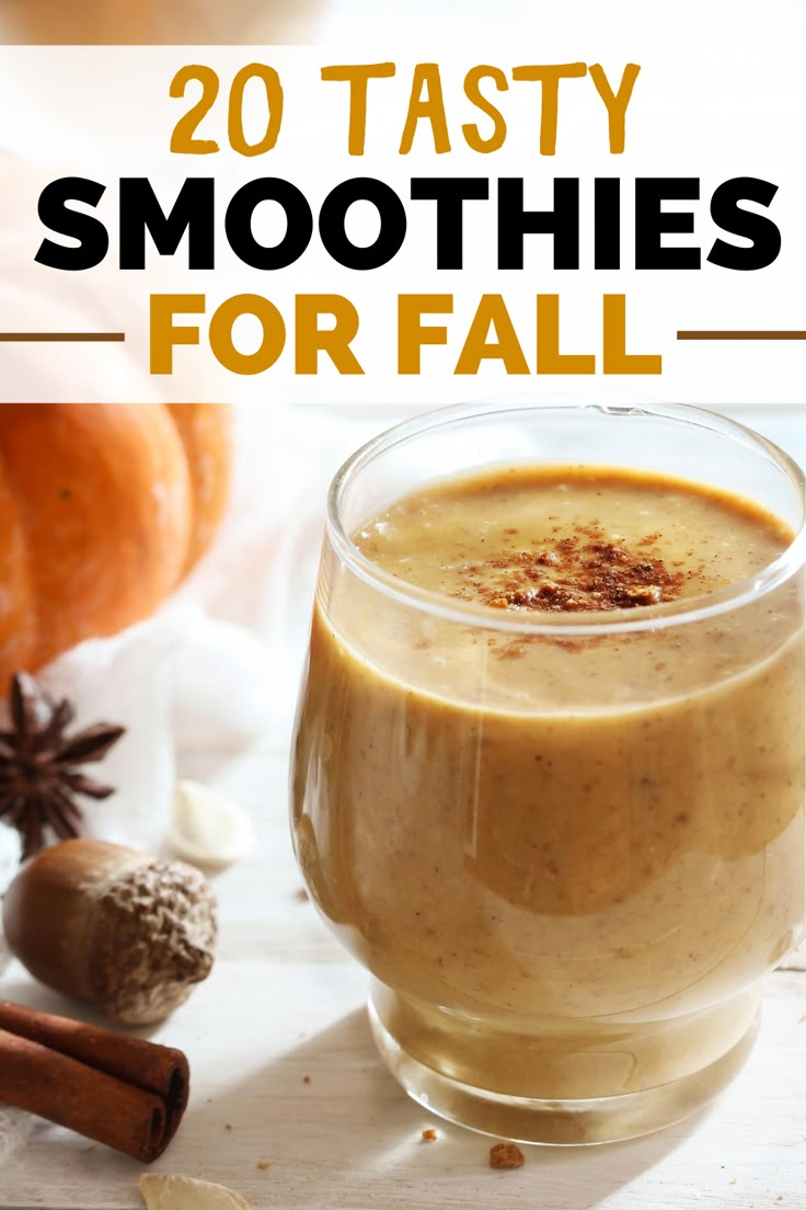 a glass filled with smoothie next to cinnamons and spices