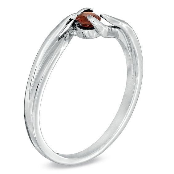 A fiery-hued round garnet is embraced within fine sterling silver for a look trend-worthy as well as timeless. Symbolizing faith, truth and friendship, the 3.4mm garnet is January's birthstone, making this ring a truly unforgettable birthday surprise. Custom made to fit her ring size, sterling silver rings can not be resized after purchase. Garnet Ruby Ring For Promise, Birthstone Ring With Polished Finish For Gift, Polished Finish Birthstone Ring As Gift, Polished Finish Birthstone Ring With Round Stone, Garnet Birthstone Ring For Anniversary, Gift Birthstone Ring With Polished Round Stone, Anniversary Garnet Birthstone Ring, Round Garnet Promise Jewelry, Round Garnet Jewelry For Promise