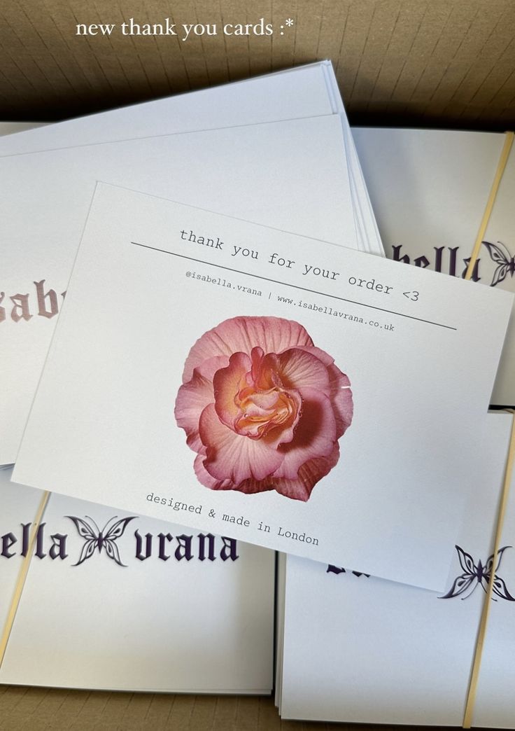 some cards are laying on top of each other with the words thank you for your order