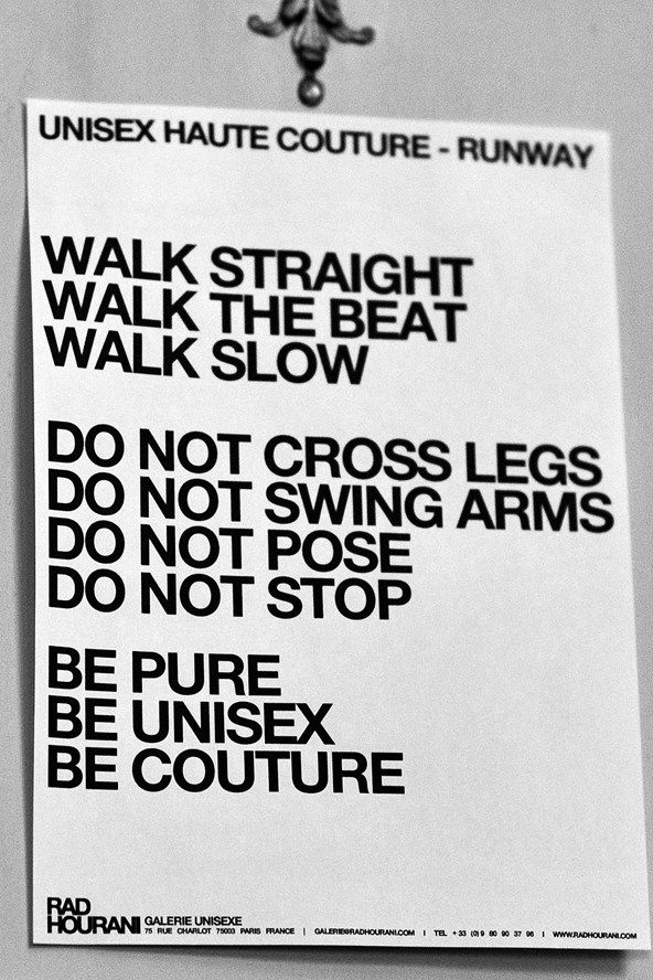 a sign hanging from the side of a wall that says walk straight, walk the beat, walk slow