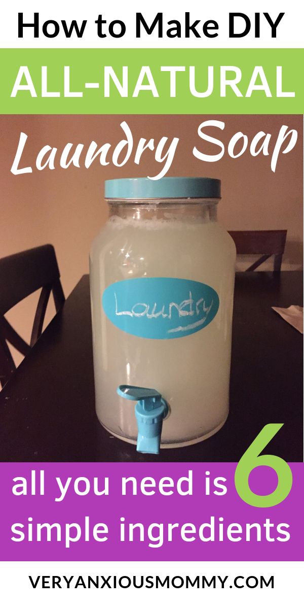 an all natural laundry soap dispenser on a table with text overlay that reads how to make diy all - natural laundry soap