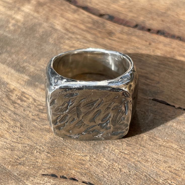 This beautifully textured, rough and rugged version of our Rounded Square Signet Ring is ready for anything life throws at it. Chunky, solidly constructed yet comfortable. These timeless signet rings are meticulously crafted by hand in our Melbourne workshop, created out of wax and then cast into precious metal. Made with the highest quality Australian sterling silver to last forever. Made solid, not hollow like many others, all of our rings are hand-stamped with a Sterling Silver (925) hallmark Hammered Signet Ring, Unique Hammered Rings For Everyday Wear, Untreated Sterling Silver Rings With Rustic Style, Rustic Untreated Ring As A Gift, Rustic Untreated Ring For Gift, Rustic Untreated Rings For Gift, Rustic Untreated Silver Ring, Rustic Silver Untreated Rings, Rough Jewelry