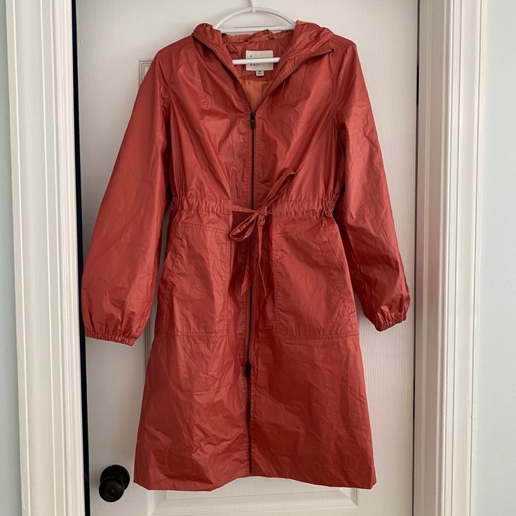 Adorable Hooded Raincoat/Windbreaker. Oversized, Very Roomy. Zip Front And Belted. Elastic Sleeve Bands. Beautiful Coat! ***Size Xs But Fits More Like A M-L*** Please Note: Tag Xs But Fits M-L Red Winter Outerwear For Rainy Weather, Trendy Hooded Outerwear For Rainy Weather, Spring Windbreaker For Cold Weather With Drawstring Hood, Spring Windbreaker With Drawstring Hood For Cold Weather, Fall Outerwear With Drawstring Hood For Rainy Weather, Fall Windbreaker With Double-lined Hood, Long Sleeve Parka For Rainy Fall Weather, Red Fall Windbreaker With Drawstring Hood, Red Windbreaker With Drawstring Hood For Fall