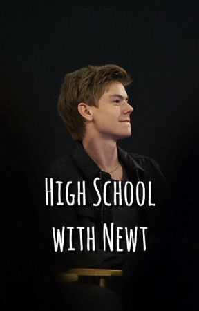 a young man sitting in front of a black background with the words high school with new