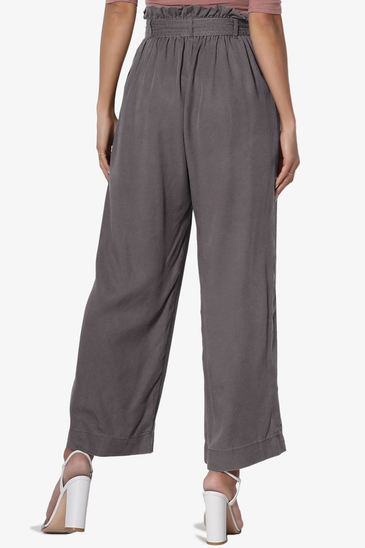 Upgrade your look with chic culotte pants, styled with an detachable tie belt and elastic paperbag waist. A high-waist hits just right and falls into a wide leg crop fit. Pair these with the Crop Top for full effect.Tencel woven, high rise with paperbag pleats, Pull onElasticized waist, Detachable sash tie beltWide leg, cropped length, side slant pocketsSize Guide : Fits true to size, take your normal size(S=1-3, M=5-7, L=9-11)Model size : 5'3" height, 34" bust, 24" waist, 34" hip, Normally wear Solid Wide Leg High Waist Pants With Tie Waist, Solid Wide Leg Pants With Tie Waist, Fall Wide Leg Pants With Tie Waist, Chic Solid Culottes With Pockets, Chic Solid Color Culottes With Pockets, Summer Solid Wide Leg Pants With Belt Loops, Relaxed Fit Wide Leg Pants With Tie Waist, Casual High Waist Wide Leg Rayon Pants, Casual Rayon Bottoms For Daywear