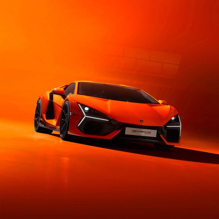 an orange sports car is shown in this artistic photo, it appears to be from the future