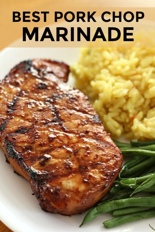 the best pork chop marinade with green beans and mashed potatoes on a white plate