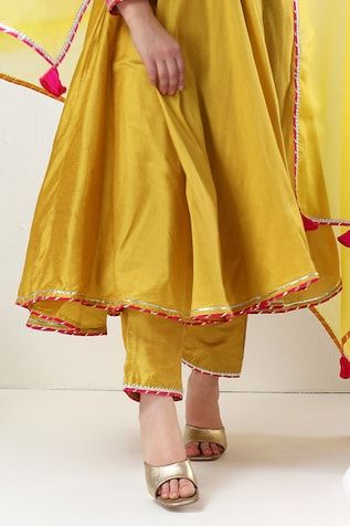 Yellow cotton silk anarkali with gota lace embroidery. Comes with pant and an organza dupatta. - Aza Fashions Diwali Slub Silk Anarkali Set With Embroidered Border, Anarkali Sharara With Embroidered Border In Slub Silk, Slub Silk Churidar With Embroidered Border For Diwali, Diwali Embroidered Slub Silk Churidar, Diwali Slub Silk Churidar With Embroidered Border, Diwali Churidar With Embroidered Border In Slub Silk, Cotton Silk Anarkali Set With Embroidered Border, Anarkali Style Raw Silk Sharara With Embroidered Border, Cotton Silk Sharara With Embroidered Border For Festivals