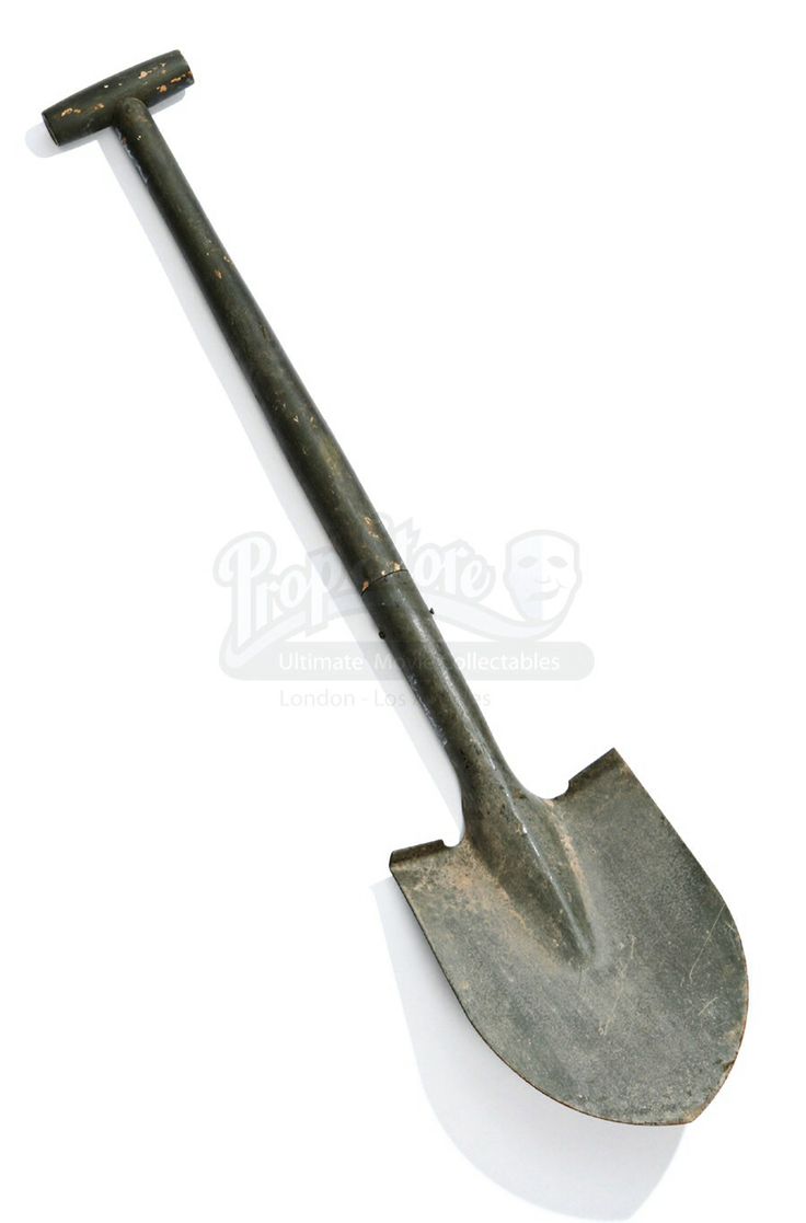 an old metal shovel on a white background