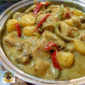 a bowl filled with meat and vegetables covered in gravy