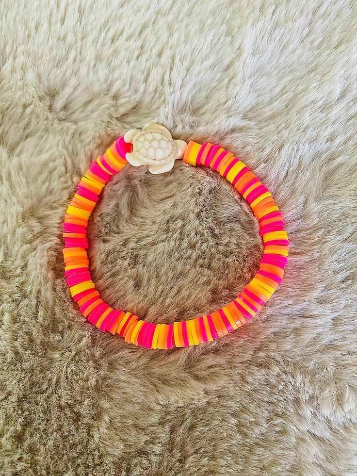 Clay bracelet made with bead spinner Bead Spinner Bracelets, Orange Large Beads Bracelets For Beach, Orange Beach Bracelets With Spacer Beads, Orange Heishi Beads Bracelets For Beach, Clay Bead Spinner, Bead Spinner, Bracelet Business, Homemade Bracelets, Bracelets Ideas