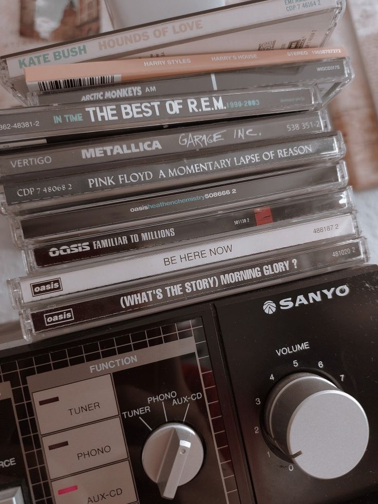 a stack of cassettes sitting on top of each other