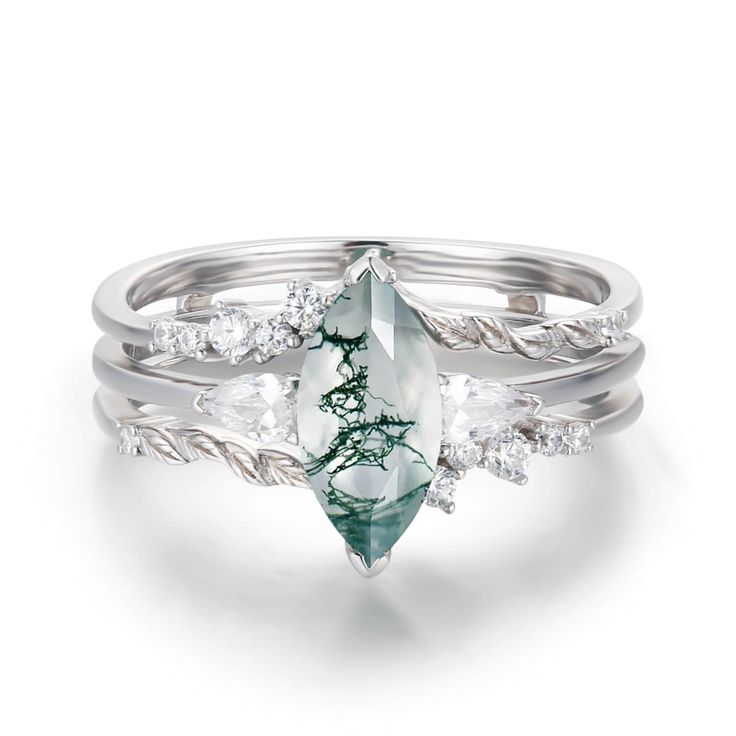 Add some serious sparkle to your look with our Sonoran Sunrise Moss Agate Ring Set. This set showcases a marquise-cut moss agate center stone with a double-curved white topaz jacket that fits like a dream. The ring jacket creates the illusion of a three-ring set, adding a unique character to your ensemble. May this ring set allow you to step up your style game and let nothing stand in your way. ✦ Available in both 14K white gold vermeil (14K white gold plated over a sterling silver base) and 10K Bff Rings, Ring Jacket, Gold Vermeil Jewelry, Moss Agate Ring, Vermeil Jewelry, Agate Ring, Shop Engagement Rings, Engagement Ring Wedding Band, Marquise Cut