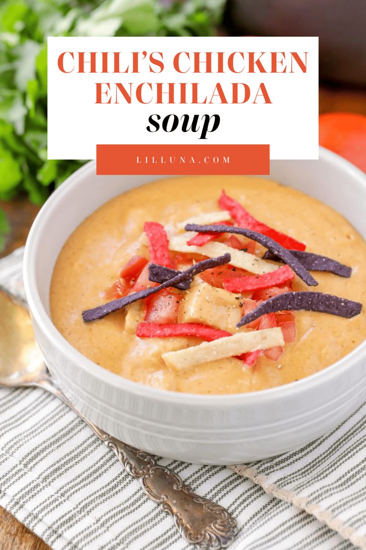 a white bowl filled with chicken enchilada soup on top of a table