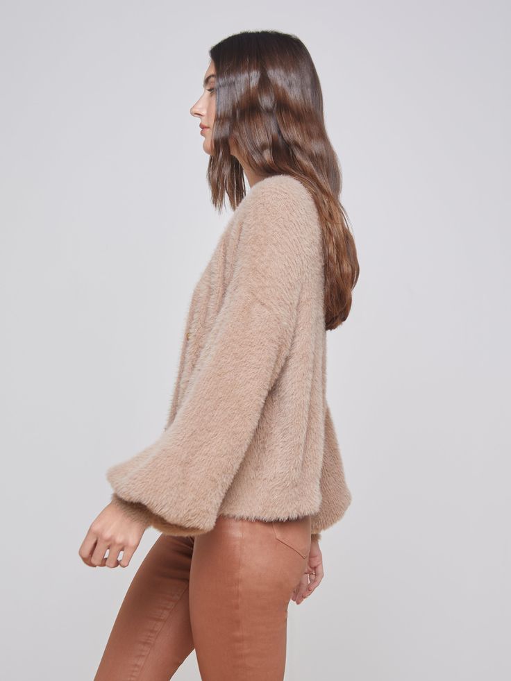 A cozy-chic cardigan in neutral beige. Relaxed-fit style complemented by deep V-neckline and dramatic blouson sleeve. In a premium fuzzy knit with a sublimely soft hand. Includes patch pockets. Gleaming gold embossed-dome buttons add luxe elegance. | L'AGENCE Harriet Cardigan In Macaroon Chic Fall Tops With Soft Texture, Chic Soft Texture Tops For Fall, Chic Tops With Soft Texture For Fall, Versatile Fall Sweater With Soft Texture, Chic Taupe Sweater For Fall, Versatile Soft Texture Sweater For Fall, Chic Long Sleeve Outerwear With Soft Texture, Soft Long Sleeve Fall Sweater, Chic Soft Texture Sweater For Fall