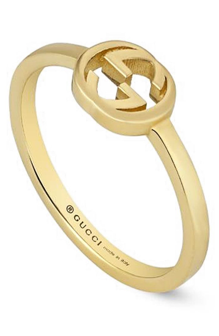 The recognizable GG-logo centers this 18-karat-gold ring that's perfect for stacking. 1/4" pendent; 1/8" band 18k gold Made in Italy Classic Gucci Engraved Ring For Anniversary, Classic Gucci Engraved Ring As Gift, Classic Gucci Engraved Ring For Gift, Gucci Fine Jewelry Rings For Formal Occasions, Classic Yellow Gold Jewelry With Logo, Gucci Formal Fine Jewelry Rings, Gucci Designer Rings In 14k Gold, Gucci 14k Gold Designer Rings, Gucci Fine Jewelry Ring For Anniversary