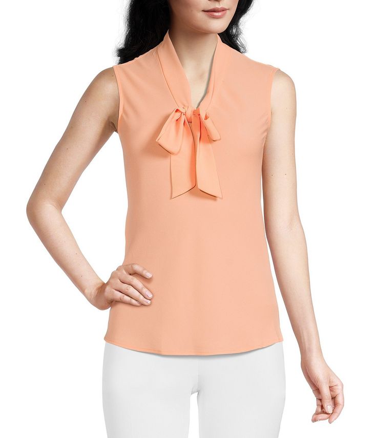 From Kasper, this blouse features:V-neckline with tie front sashSleevelessStraight hemlinePullover constructionPolyesterDry cleanImported. Elegant V-neck Top With Bow, Elegant Sleeveless Blouse With Bow, Formal Sleeveless Top With Bow, Spring V-neck Top With Bow Detail, Spring V-neck Top With Bow, V-neck Top With Bow For Spring, Chic Sleeveless Top With Tie Waist, Elegant Summer Blouse With Tie Waist, Summer Bow V-neck Top