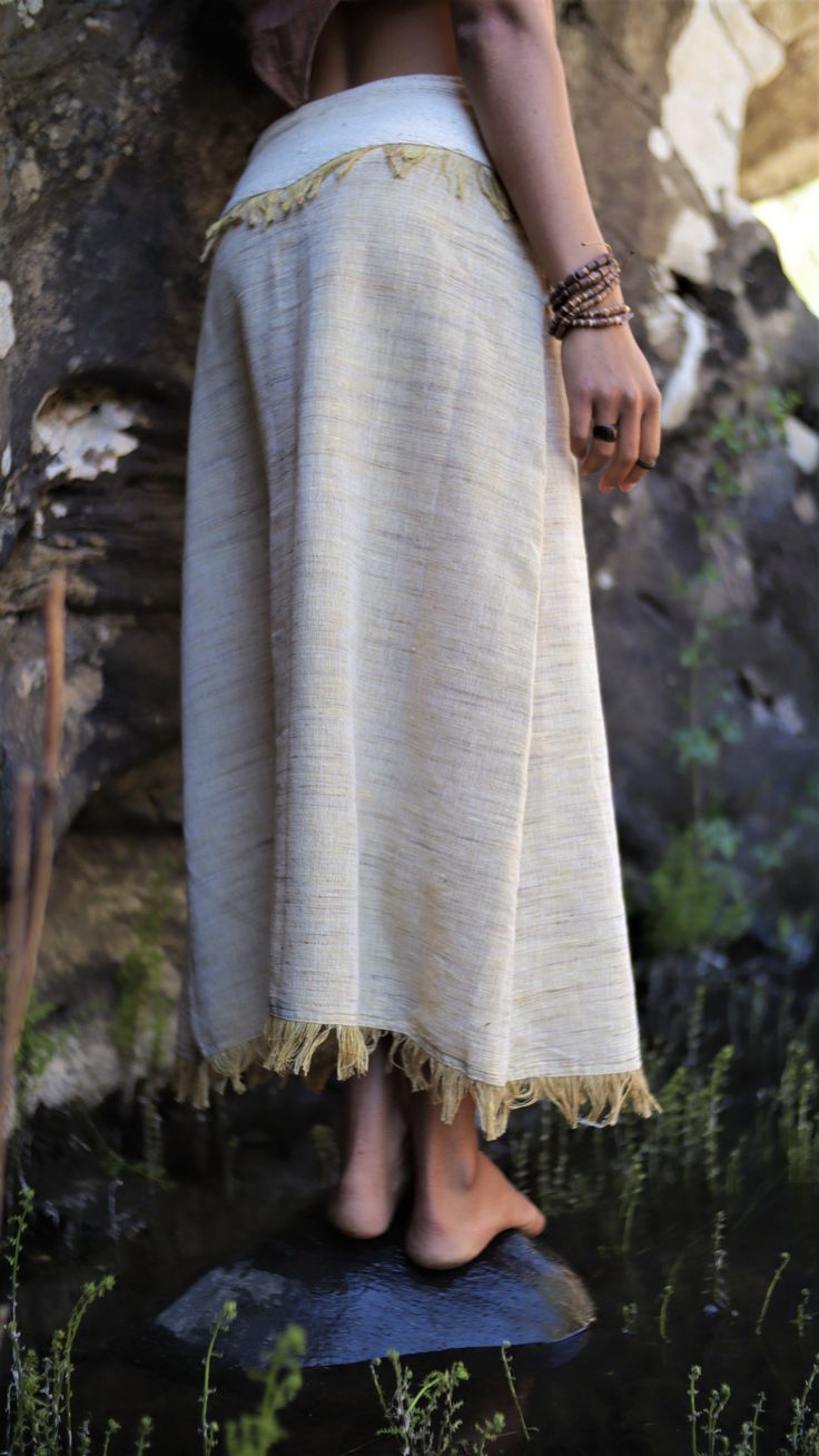 Bohemian Ankle-length Cotton Skirt, Traditional Skirt With Woven Motifs, Traditional Relaxed Flared Maxi Skirt, Traditional Flared Maxi Skirt, Relaxed Bohemian Cotton Wrap Skirt, Traditional Relaxed Fit Flared Maxi Skirt, Traditional Cotton Skirt, Traditional Relaxed Lined Maxi Skirt, Traditional Relaxed Skirt For Festival