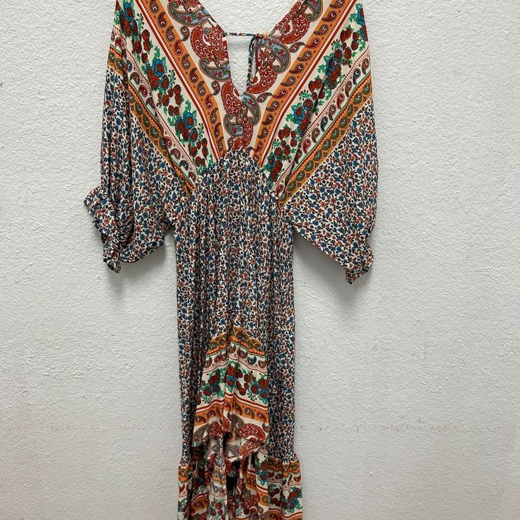 Umgee New With Tags Boho Dress Low Cut Front And Back 3/4 Length Sleeves Orange V-neck Summer Maxi Dress, Orange V-neck Maxi Dress For Vacation, Orange V-neck Maxi Dress For Beach, Orange V-neck Midi Dress For Beach, Long Printed Hippie Dresses, Multicolor Boho Print V-neck Dress, Festival Boho Print Midi Dress With V-neck, V-neck Midi Dress With Boho Print For Festivals, Festival Midi Dress With Boho Print And V-neck