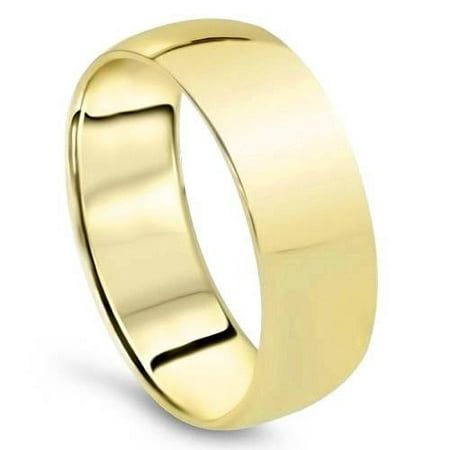 a yellow gold wedding ring on a white background