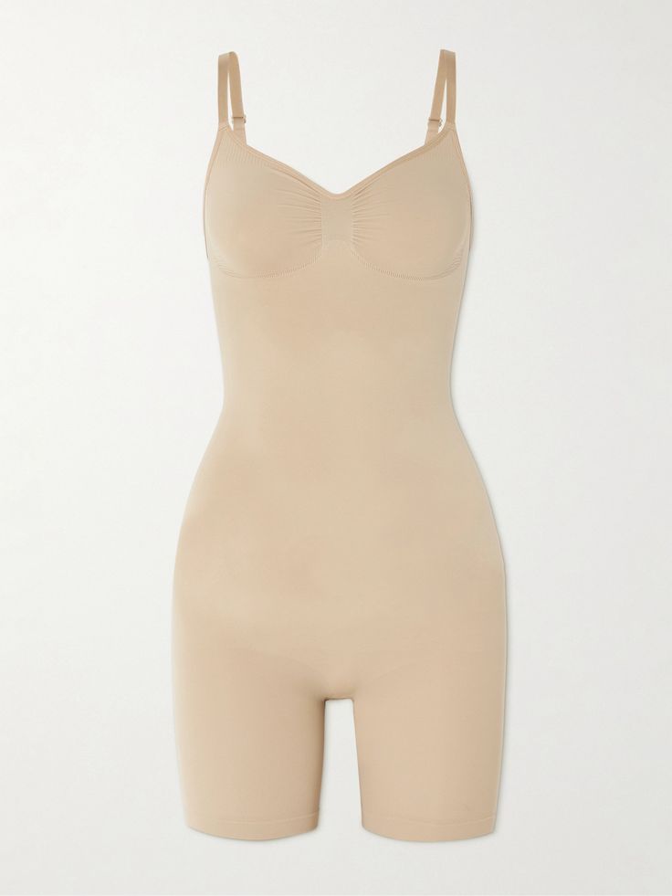 SKIMS' 'Seamless Sculpt' collection is designed to smooth and define the figure. Made from high-compression stretch fabric, this bodysuit has mid-length shorts and a scooped back, so you can wear it under low-cut dresses or tops. Fitted Beige Seamless Bodysuit, Beige Stretch Full Coverage Bodysuit, Beige Stretch Bodysuit With Medium Bust Support, Fitted Seamless Beige Bodysuit, Fitted Elastane Shapewear With Seamless Construction, Beige Fitted Nylon Shapewear, Micro-elastic Nylon Shapewear With Seamless Construction, Fitted Seamless Shapewear Bodysuit, Beige Micro-elastic Seamless Shapewear