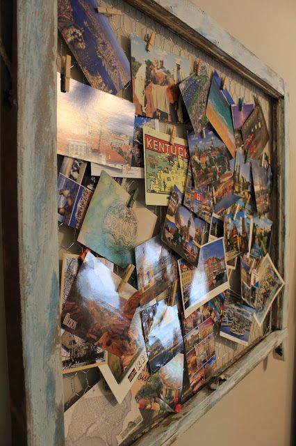 a bulletin board covered in pictures and magnets