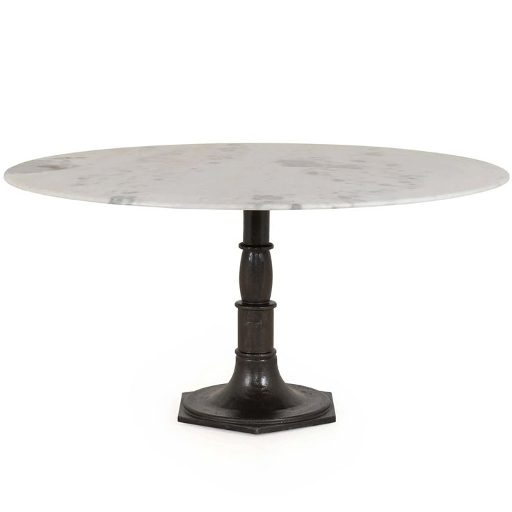 an oval marble table with black pedestals and metal base, against a white background