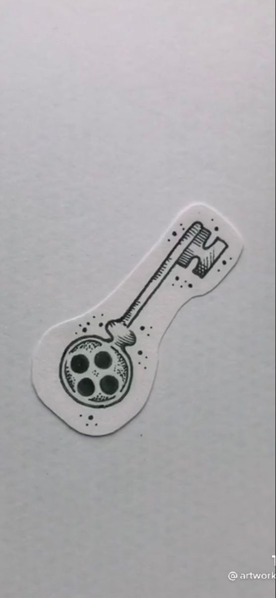 an image of a sticker with a toothbrush in the shape of a wrench