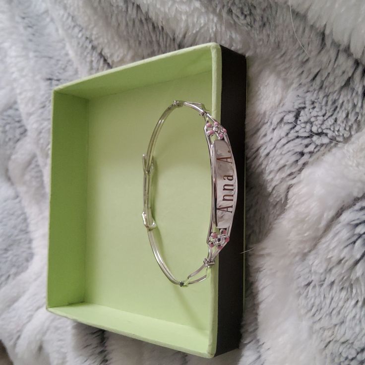 Sterling Silver With Pink Flowers And Initials Anna A. Can Be Adjusted But For A Baby Or Toddler Wrist. The Bracelet Is Brand New Never Worn, In Original Box. It Was A Gift Too Small. Silver Sterling Silver Name Bracelet For Promise, Silver Metal Promise Bracelets, Silver Metal Bracelets For Promise, Silver Promise Bracelet, Silver Sterling Silver Bracelets For Birthday, Silver Sterling Silver Bracelets For Promise, Silver Metal Promise Bracelet, Adjustable Personalized Silver Bracelets, Personalized Silver Promise Bracelets