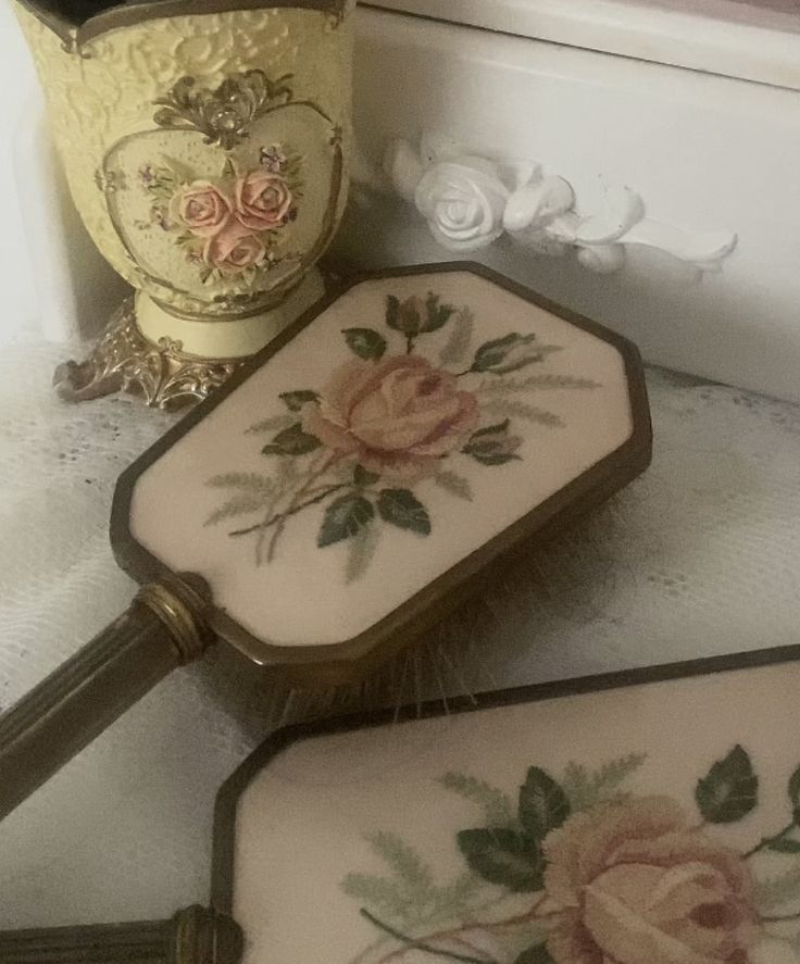 three decorative trays sitting on top of a counter