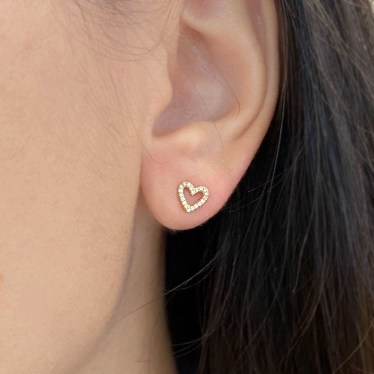 Fun and flirty heart diamond studs. These earrings are set with mini diamonds to give off the ultimate sparkle! Wear them on their own, or pair with our other huggies and studs for a fun ear stack. Diamonds (0.07 ct) 14k yellow, rose, or white gold Please allow 4-6 weeks for production of out-of-stock items. Cute Studs Earrings, Small Heart Earrings, Heart Earrings Gold, Heart Gold Earrings, Mini Earrings Gold, Small Earrings Studs Unique, Cute Diamond Earrings, Heart Diamond Earrings, Diamond Heart Earrings