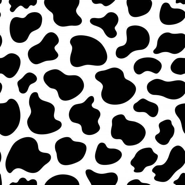 a black and white animal print pattern that looks like it has spots on the skin