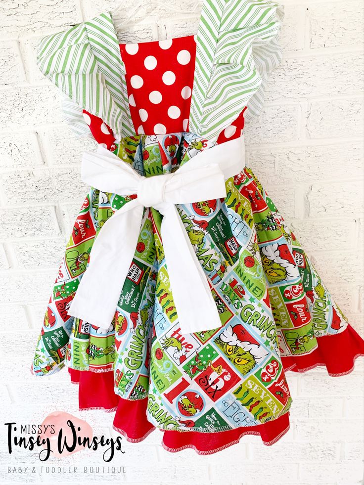 Follow link to purchase ! Playful Dresses For Holiday Parties, Fitted Cotton Dresses For Holiday, Green Christmas Dress-up Dresses, Green Christmas Dress For Dress-up, Green Christmas Dresses For Dress-up, Fun Red Ruffled Dress, Green Ruffled Dress For Holiday, Christmas Cotton Dress With Ruffles, Festive Fitted Green Holiday Dress