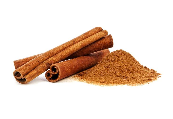 cinnamon sticks and powder on a white background with clippings to the left side