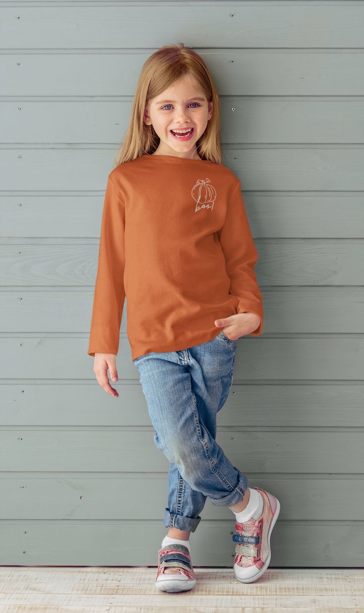 The Cute Fall Sweatshirt for Girl is a perfect Pumpkin Sweatshirt for Young Girl, making an ideal Birthday Gift for Her for Autumn. This Lightweight Soft Crewneck Long Sleeve Tee combines comfort and style, ensuring she stays cozy and fashionable throughout the season. The Sport-Tek Competitor tee bears all the marks of comfort and style. Made 100% with the signature polyester blend that features PosiCharge ® technology, this tee is lightweight, breathable, and moisture wicking. Discover the per Fall Birthday Crew Neck Tops, Long Sleeve Tops With Graphic Print For Birthday, Long Sleeve Fall Birthday Sweatshirt, Graphic Print Tops For Birthday In Fall, Casual Tops For Fall Birthday, Cute Fall Birthday Tops, Pumpkin Sweatshirt, Pumpkin Sweatshirts, Birthday Gift For Her