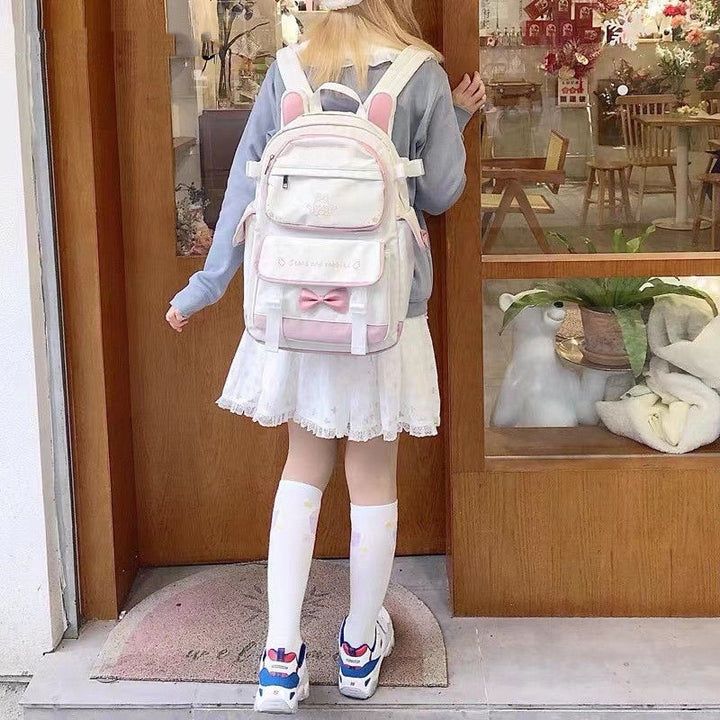 This Kawaii Colorful Bunny School Backpack is the perfect companion for stylish students who want to make a statement. Crafted from high-quality materials with playful bunny details and vibrant colors, this backpack adds a touch of sophistication to any outfit. It's the perfect blend of artistic flair mixed with practicality: a work of art you can carry to school, work, or the library. Kawaii Backpack For Back To School, Kawaii Back To School Backpack, Kawaii Back-to-school Backpack, Cute Kawaii Backpack For School, Kawaii Backpack With Cute Design For School, Kawaii Cute Design School Backpack, Cute White Backpack For Study, Casual Student Backpack With Cute Design, Trendy Cute Design Backpack For School