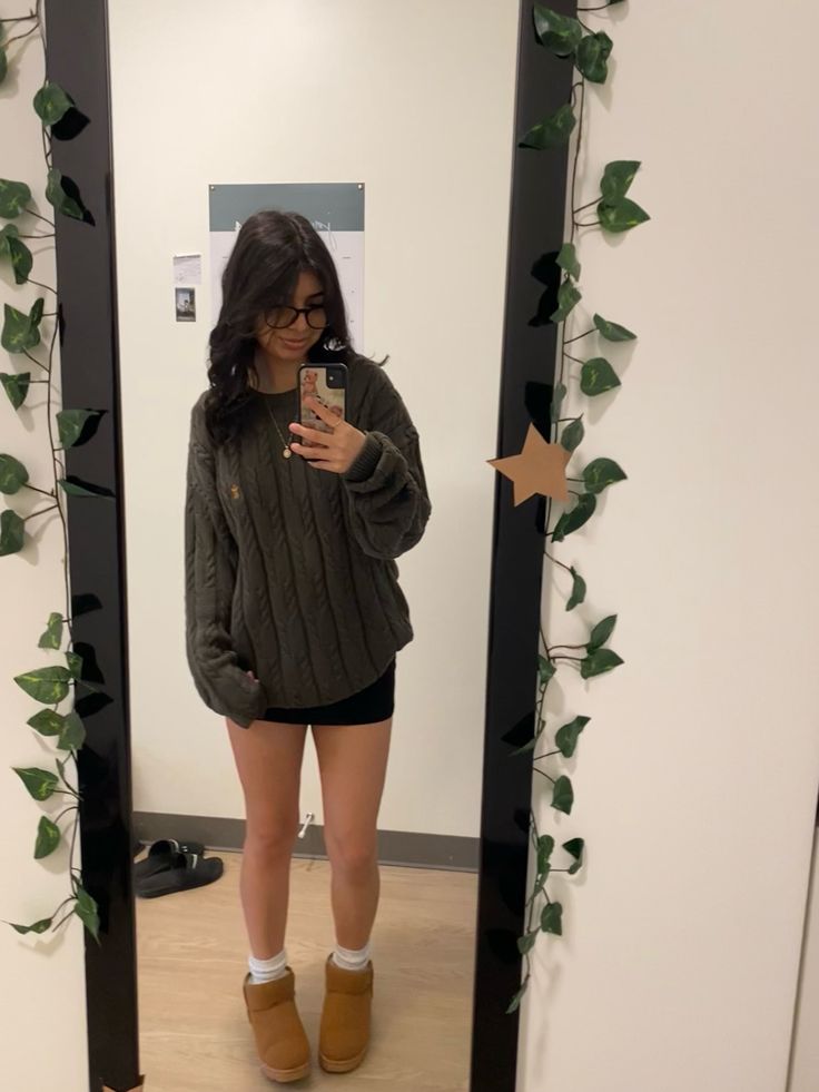 mini skirt, sweater, uggs, outfit inspo Ugg Mini Skirt Outfit, Summer Ugg Outfits, How To Style Mini Uggs, Black Converse Outfit Winter, Uggs With Skirt, Black Skirt With Tights, Black Mini Skirt Fits, Mini Skirt And Sweater Outfit, Mini Black Skirt Outfit