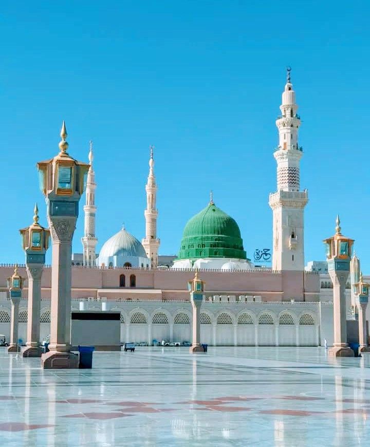 a large building with many towers and domes on it's sides in the middle of a courtyard